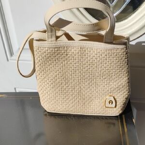 Elegant Etienne Aigner Cream Woven Handbag
